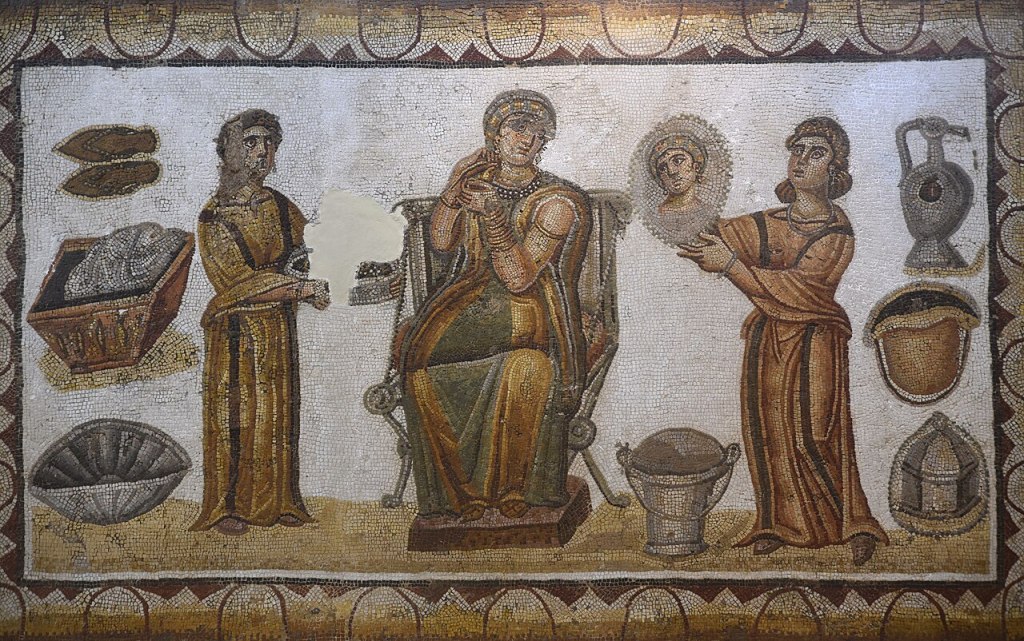 Roman mosaic panel of a noblewoman depicted as Venus and surrounded by two maidservants helping her dress and comb her hair, dated to the 5th century AD, from the ladies changing room of the Sidi Ghrib Baths, National Museum of Bardo